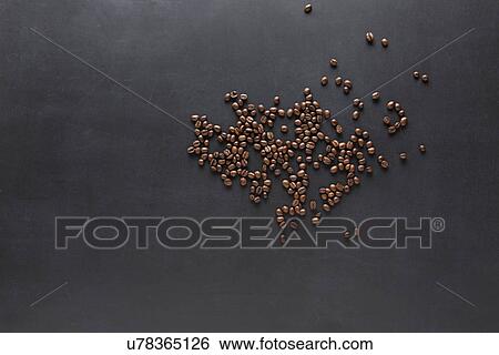 Coffee beans on a blackboard View Large Photo Image Stock Photograph - Coffee beans on a blackboard. Fotosearch