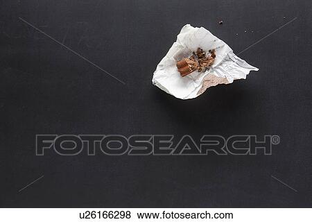 Confectionery in paper wrapper on blackboard View Large Photo Image Stock Photo - Confectionery in paper wrapper on blackboard. Fotosearch