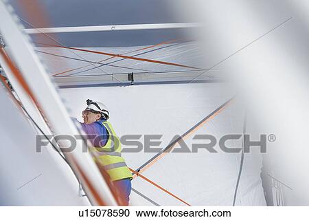 Emergency Response Team worker erecting tent control centre View Large Photo Image Stock Image - Emergency Response Team worker erecting tent control centre. Fotosearch
