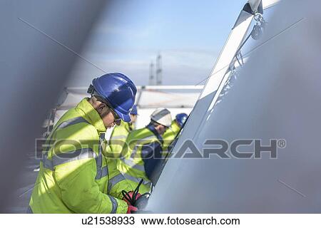 Emergency Response Team workers erecting tent control centre View Large Photo Image Stock Image - Emergency Response Team workers erecting tent control centre. Fotosearch