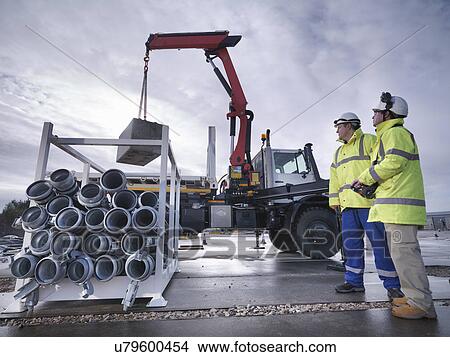 Emergency Response workers training with truck crane View Large Photo Image Picture - Emergency Response workers training with truck crane. Fotosearch