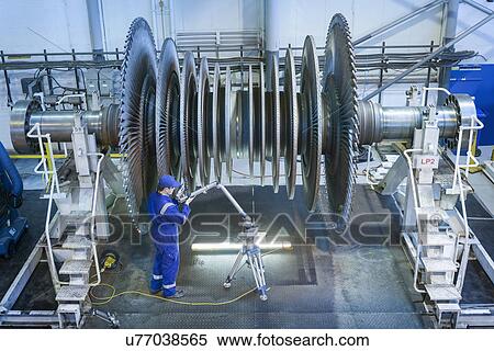 Engineer measuring low pressure steam turbine parts in repair works View Large Photo Image Stock Photography - Engineer measuring low pressure steam turbine parts in repair works. Fotosearch