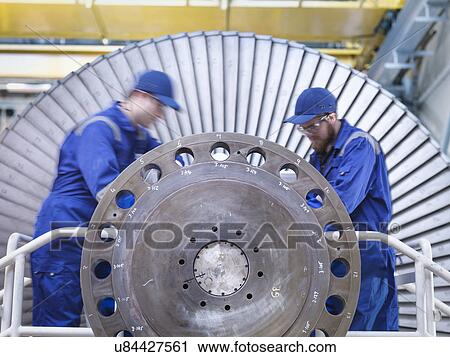 Engineers repairing steam turbine in workshop View Large Photo Image Stock Image - Engineers repairing steam turbine in workshop. Fotosearch
