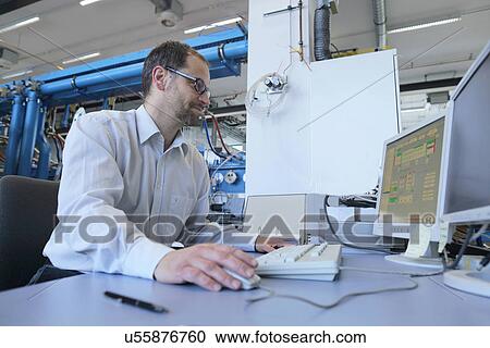 Manager monitoring information on computer View Large Photo Image Stock Image - Manager monitoring information on computer. Fotosearch