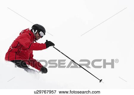 Mid adult man skiing, Obergurgl, Austria View Large Photo Image Stock Photo - Mid adult man skiing, Obergurgl, Austria. Fotosearch