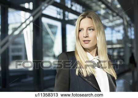 Portrait of business woman at airport View Large Photo Image Stock Image - Portrait of business woman at airport. Fotosearch