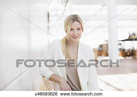 Portrait of business woman at airport View Large Photo Image Stock Photograph - Portrait of business woman at airport. Fotosearch