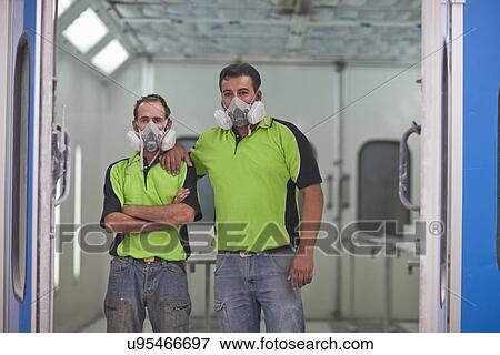 Portrait of carpenters in spray painting workshop doorway View Large Photo Image Stock Photo - Portrait of carpenters in spray painting workshop doorway. Fotosearch