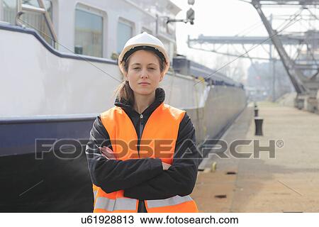 Portrait of female dockworker View Large Photo Image Stock Image - Portrait of female dockworker. Fotosearch