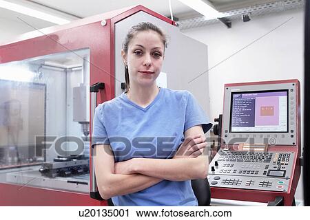 Portrait of female engineer in computer room View Large Photo Image Stock Image - Portrait of female engineer in computer room. Fotosearch