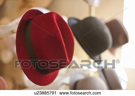 Row of hats in traditional milliners shop View Large Photo Image Stock Image - Row of hats in traditional milliners shop. Fotosearch