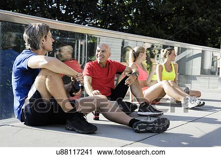 Runners taking break View Large Photo Image Stock Image - Runners taking break. Fotosearch