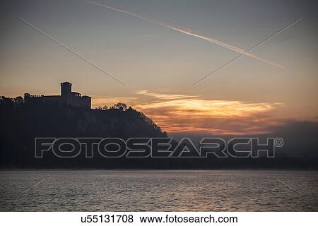 Silhouette of Castello di Angera, Lake Maggiore, Italy View Large Photo Image Stock Photo - Silhouette of Castello di Angera, Lake Maggiore, Italy. Fotosearch