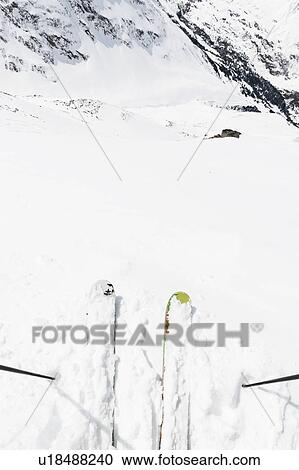 Skis and ski poles on top of slope, Obergurgl, Austria View Large Photo Image Stock Image - Skis and ski poles on top of slope, Obergurgl, Austria. Fotosearch