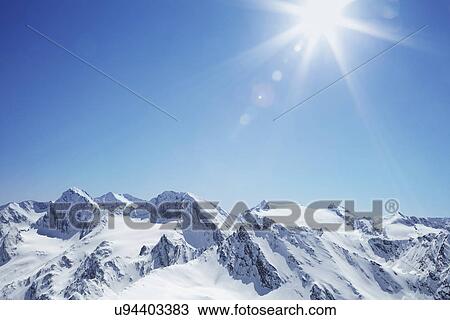 View of snow covered mountain range, Hochgurgi, Austria View Large Photo Image Stock Image - View of snow covered mountain range, Hochgurgi, Austria. Fotosearch