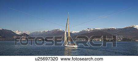 Yacht on Lake Maggiore, Lombardy, Italy View Large Photo Image Stock Image - Yacht on Lake Maggiore, Lombardy, Italy. Fotosearch