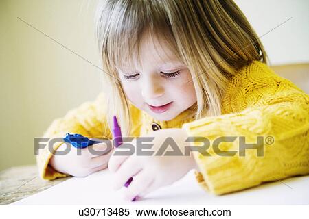 Young girl at kitchen table coloring in with felt pens View Large Photo Image Stock Photography - Young girl at kitchen table coloring in with felt pens. Fotosearch
