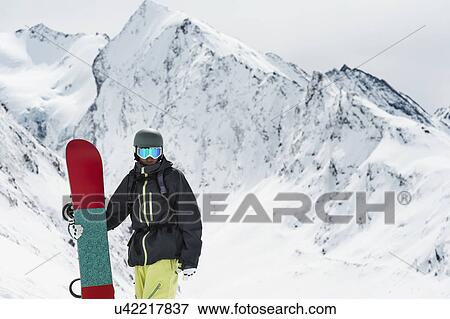 Young male snowboarder, Obergurgl, Austria View Large Photo Image Stock Photo - Young male snowboarder, Obergurgl, Austria. Fotosearch