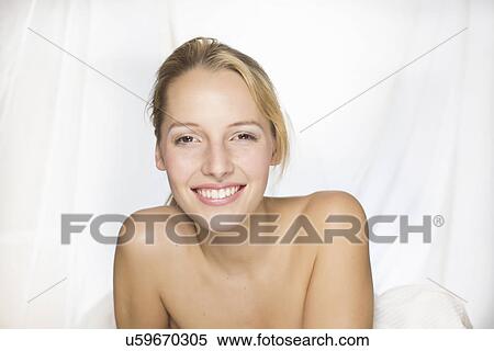 Young topless woman smiling View Large Photo Image Stock Photography - Young topless woman smiling. Fotosearch