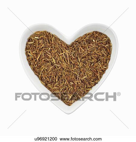 Stock Image - Cumin seeds. Fotosearch