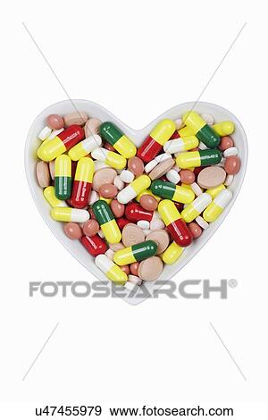 Pills in a dish View Large Photo Image Stock Photo - Pills in a dish. Fotosearch