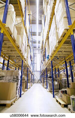 Aisle and shelves in distribution warehouse View Large Photo Image Picture - Aisle and shelves in distribution warehouse. Fotosearch