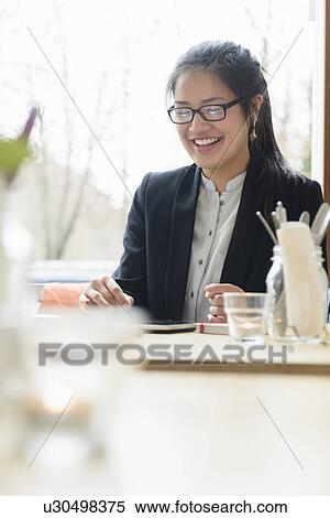 Business woman using digital tablet View Large Photo Image Stock Photography - Business woman using digital tablet. Fotosearch