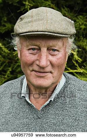 Close up portrait of senior man with a wise smile View Large Photo Image Stock Photo - Close up portrait of senior man with a wise smile. Fotosearch