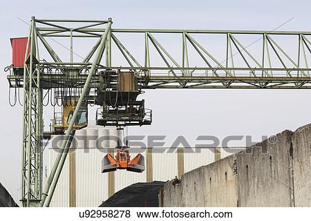 Crane bridge and grab in port View Large Photo Image Stock Photo - Crane bridge and grab in port. Fotosearch