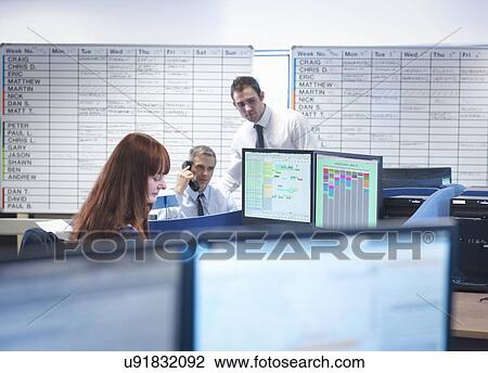 Engineers working together in office View Large Photo Image Stock Image - Engineers working together in office. Fotosearch