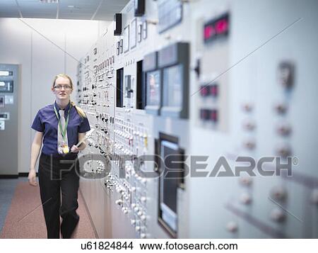 Female engineer in nuclear power station control room simulator View Large Photo Image Picture - Female engineer in nuclear power station control room simulator. Fotosearch