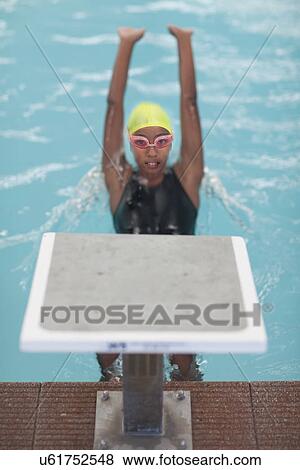 Girl backstroke training in swimming pool View Large Photo Image Stock Photo - Girl backstroke training in swimming pool. Fotosearch