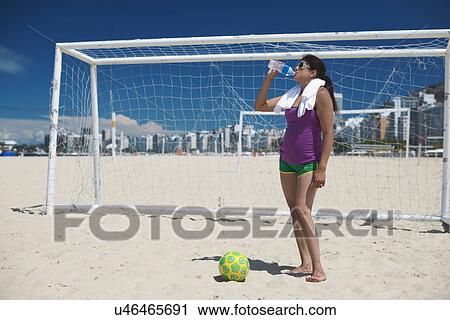 Mature woman and soccer ball on Copacabana beach, Rio De Janeiro, Brazil View Large Photo Image Stock Image - Mature woman and soccer ball on Copacabana beach, Rio De Janeiro, Brazil. Fotosearch