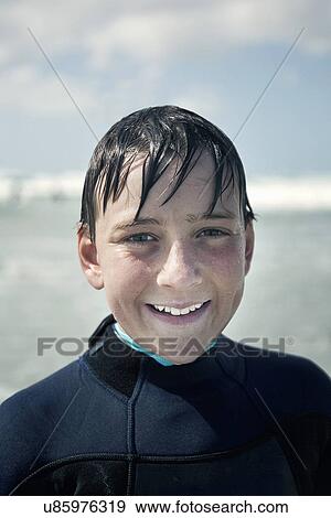 Portrait of boy wearing wetsuit View Large Photo Image Stock Photo - Portrait of boy wearing wetsuit. Fotosearch