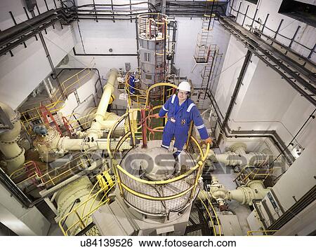 Portrait of engineer in seawater pumping station of power station, high angle view View Large Photo Image Stock Photograph - Portrait of engineer in seawater pumping station of power station, high angle view. Fotosearch