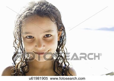 Stock Photography - Portrait of girl with wet hair. Fotosearch
