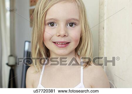 Portrait of innocent young girl in corridor View Large Photo Image Stock Image - Portrait of innocent young girl in corridor. Fotosearch