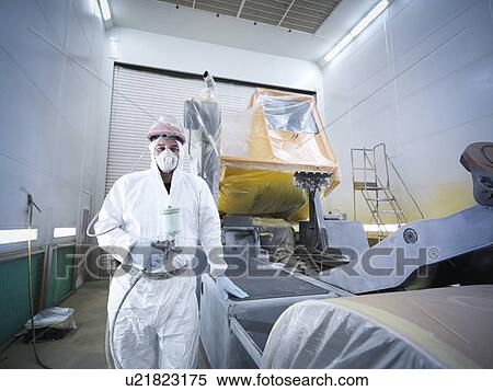 Portrait of paint spray technician in truck repair factory View Large Photo Image Stock Photography - Portrait of paint spray technician in truck repair factory. Fotosearch
