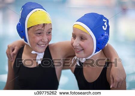 Portrait of two schoolgirl water polo players View Large Photo Image Stock Image - Portrait of two schoolgirl water polo players. Fotosearch