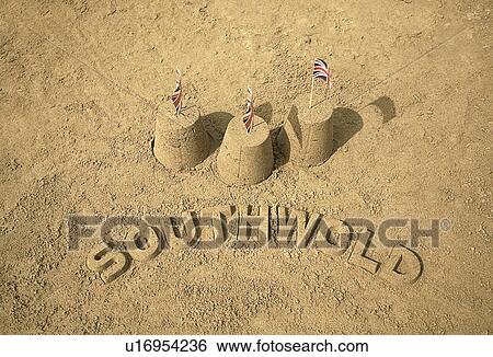Sandcastles with british flags and Southwold View Large Photo Image Stock Photograph - Sandcastles with british flags and Southwold. Fotosearch