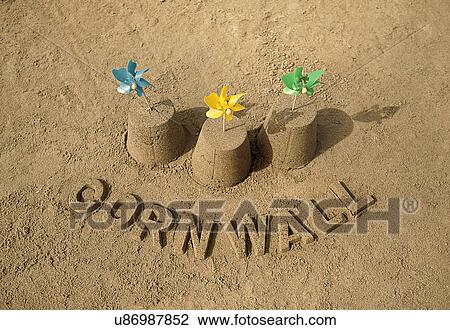 Sandcastles with windmills and Cornwall View Large Photo Image Stock Image - Sandcastles with windmills and Cornwall. Fotosearch