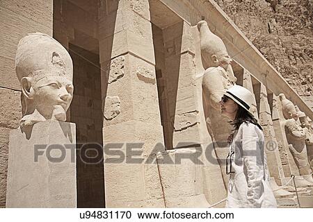 Stock Image - Statues at the Mortuary Temple of Queen Hatshepsut, Egypt. Fotosearch