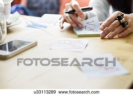 Stock Photo - Woman writing love notes. Fotosearch