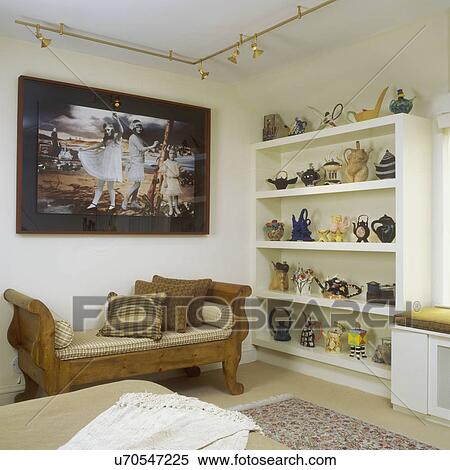 Built In Shelves Displaying Large Original Folk Art Inspired Teapots In Bedroom Stock Photography