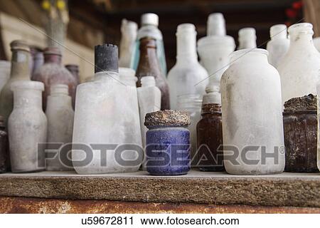 Stock Image - Close-up of antique bottles; Oro Grande; California; USA. Fotosearch