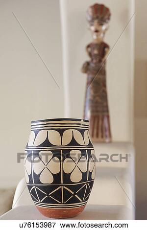 Stock Photo - Close-up of centerpieces in shelf at home; Santa Fe; New Mexico; USA. Fotosearch