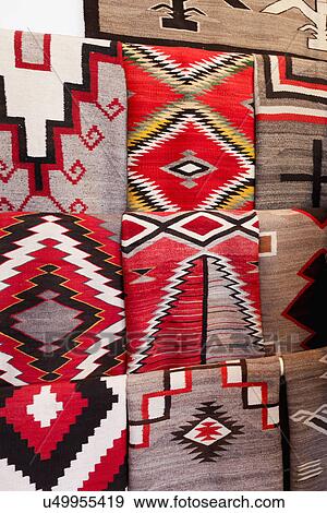 Stock Photo - Detail of Native American rugs at Shiprock Rug Trading; Santa Fe; New Mexico; USA. Fotosearch