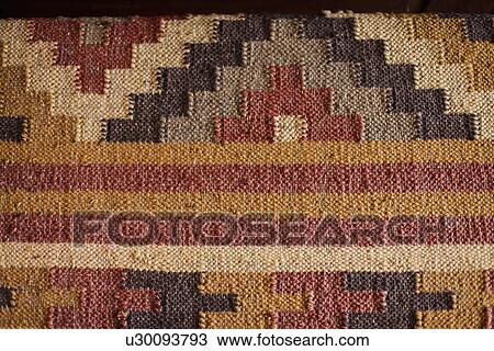 Stock Image - Detail shot of colorful carpet; Santa Fe; New Mexico; USA. Fotosearch