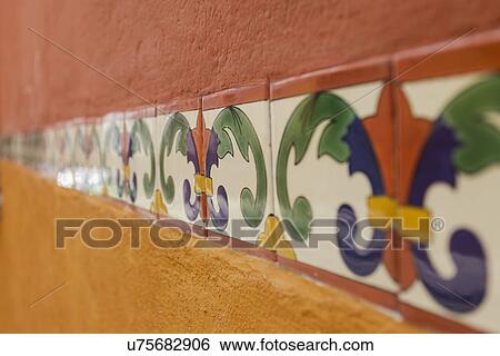 Stock Photograph - Detail shot of vibrant colored wall; San Miguel de Allende; Guanajuato; Mexico. Fotosearch