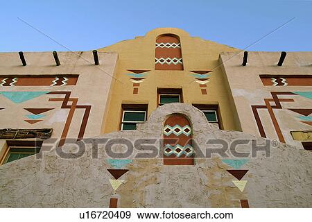 Stock Photo - Low angle view of a colorful structure against the blue sky; Silver City; New Mexico; USA. Fotosearch